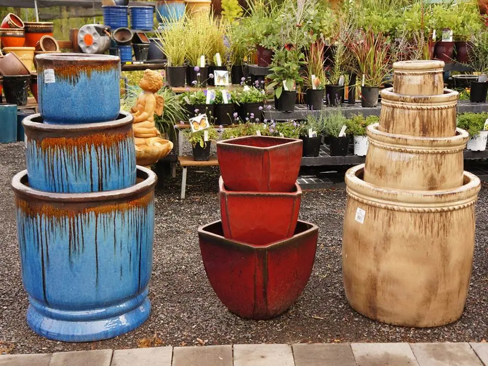 Tiered fountains made from glazed blue, red and tan pots